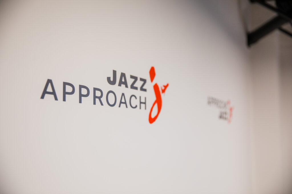 Jazz Approach program branding displayed on an interior wall

